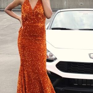 Morgan & Co Elegant Orange Sequin Evening Gown